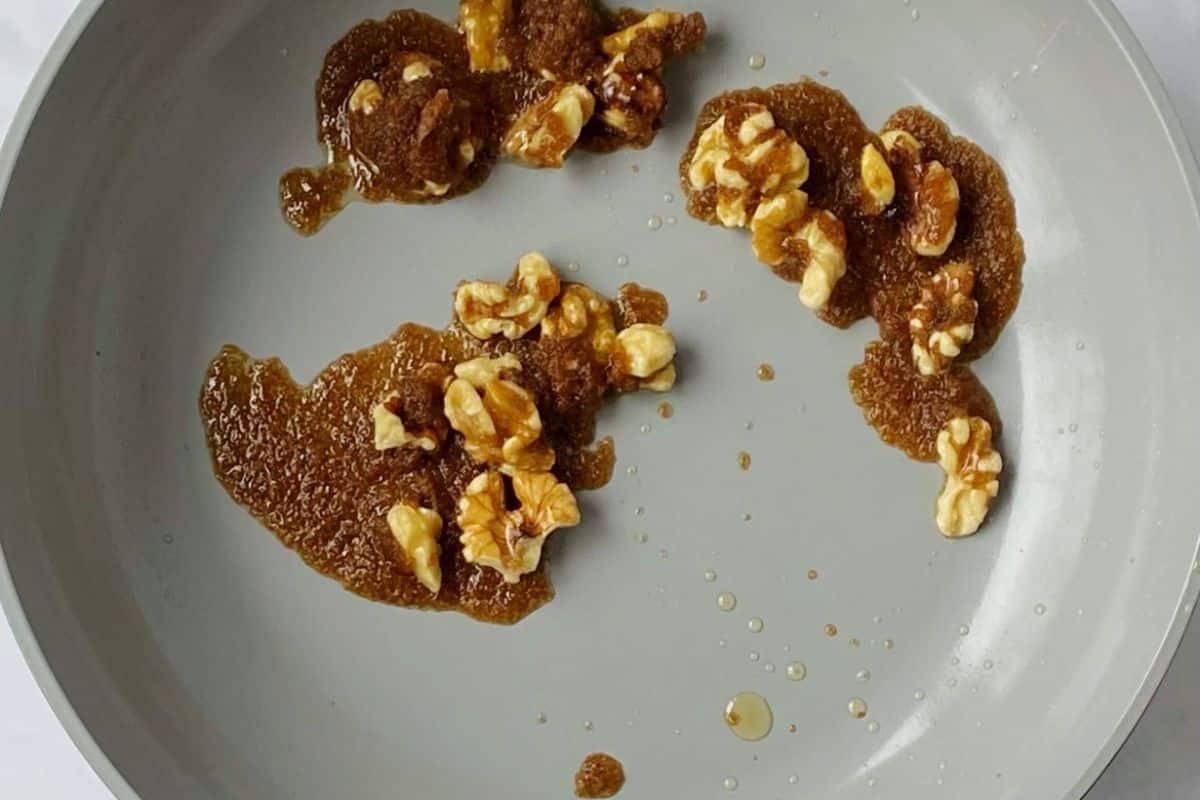 walnuts tossed with sugar butter mixture.