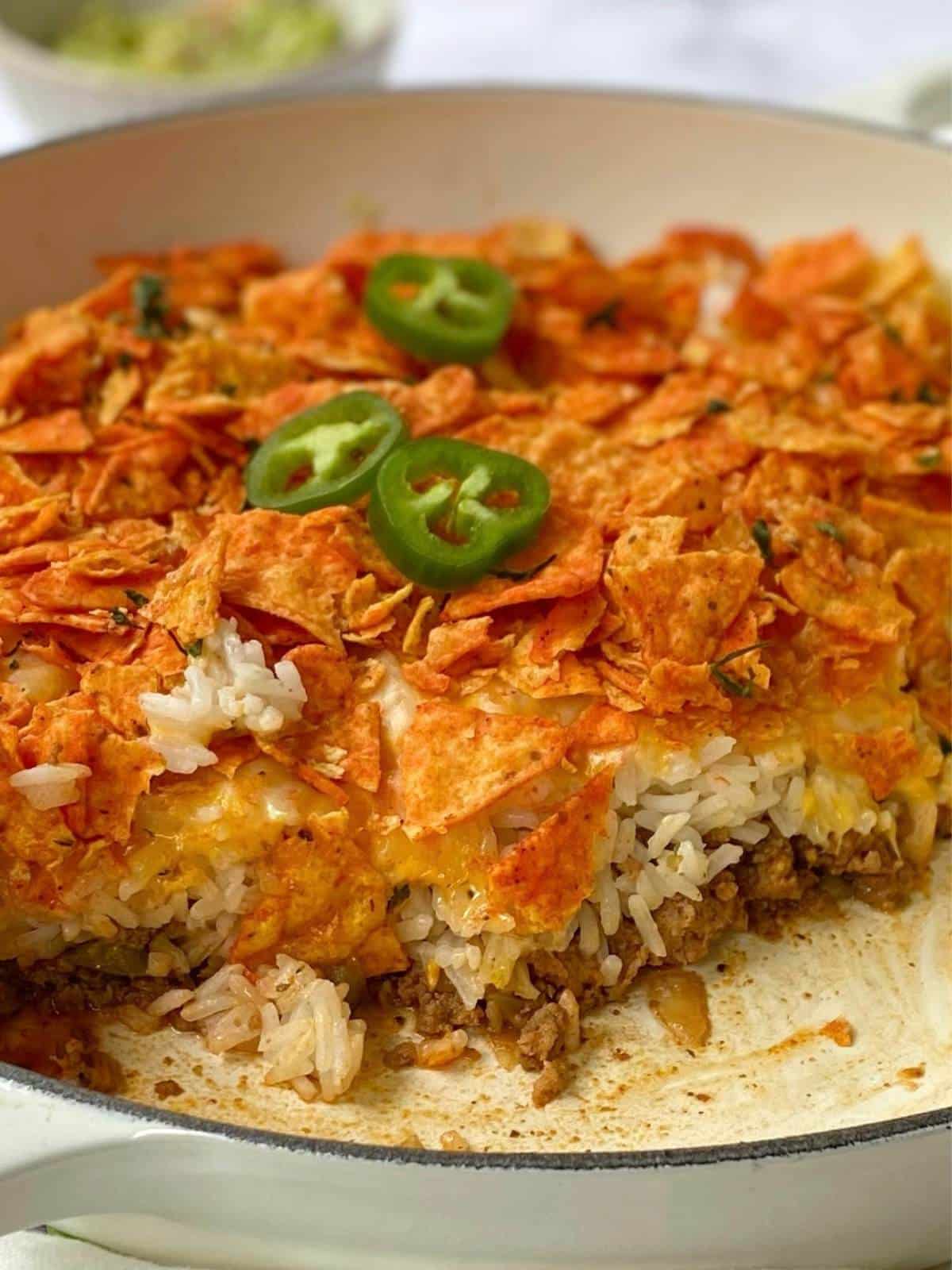 close up side view of partially eaten taco casserole.