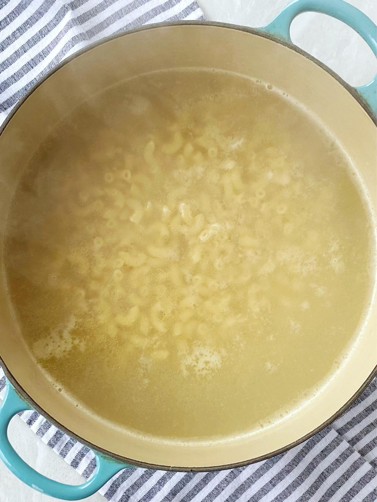 boiling pasta for mac and cheese.