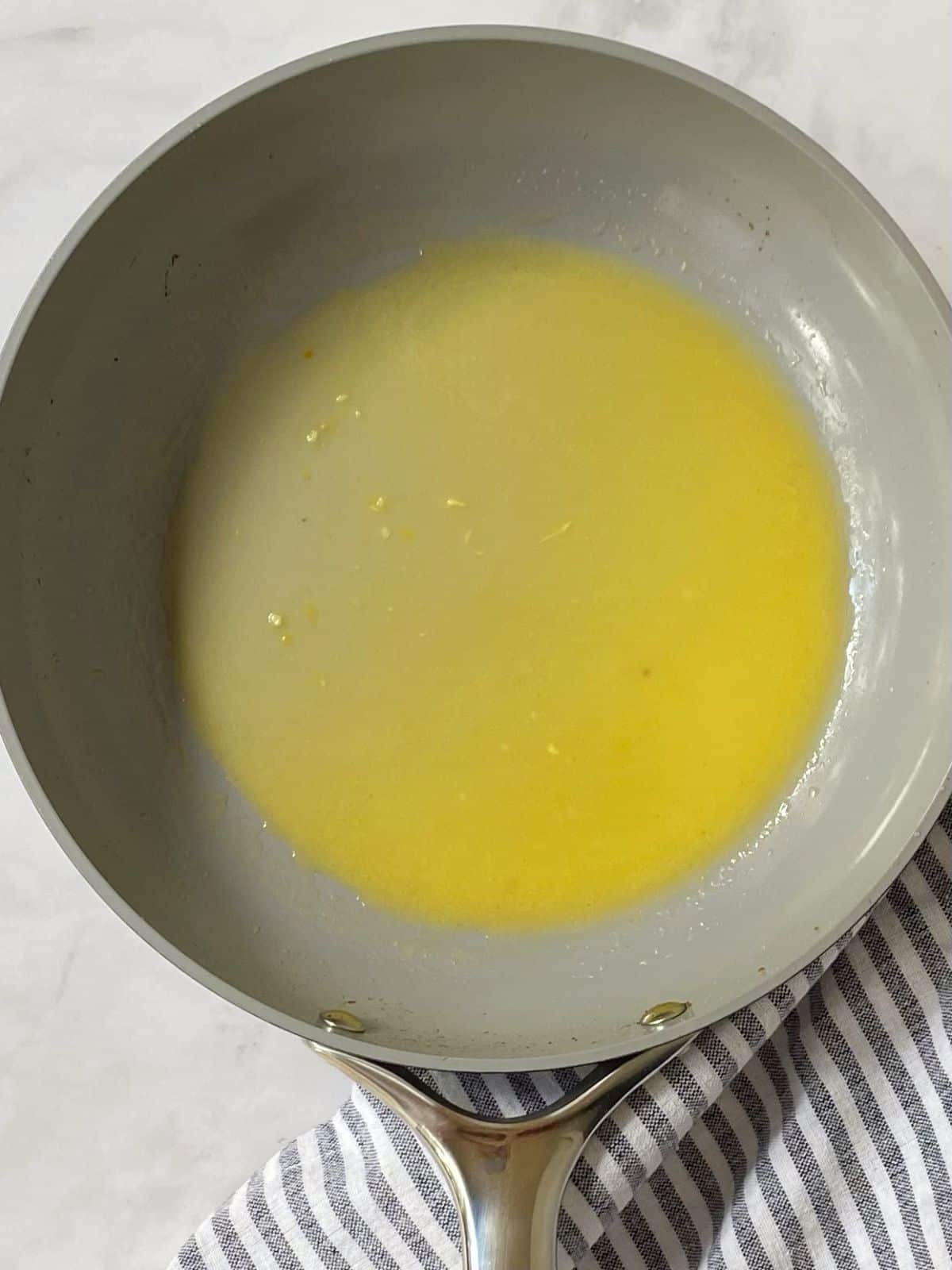 orange butter in a skillet.