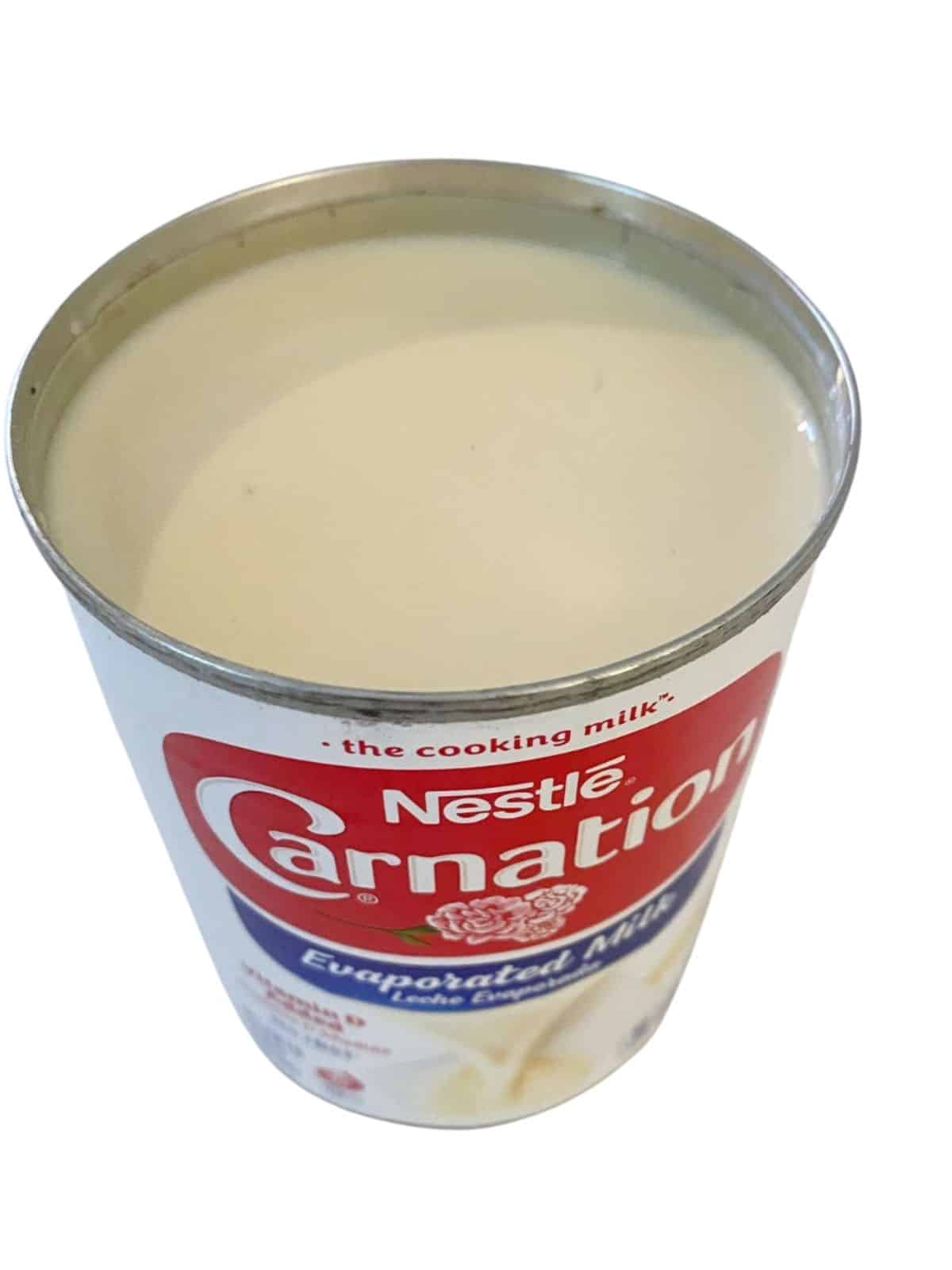 open can of evaporated milk.