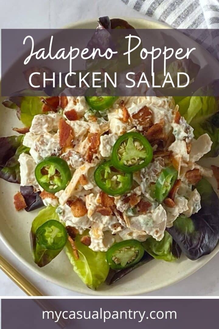 jalapeno popper chicken salad on a plate with lettuce.