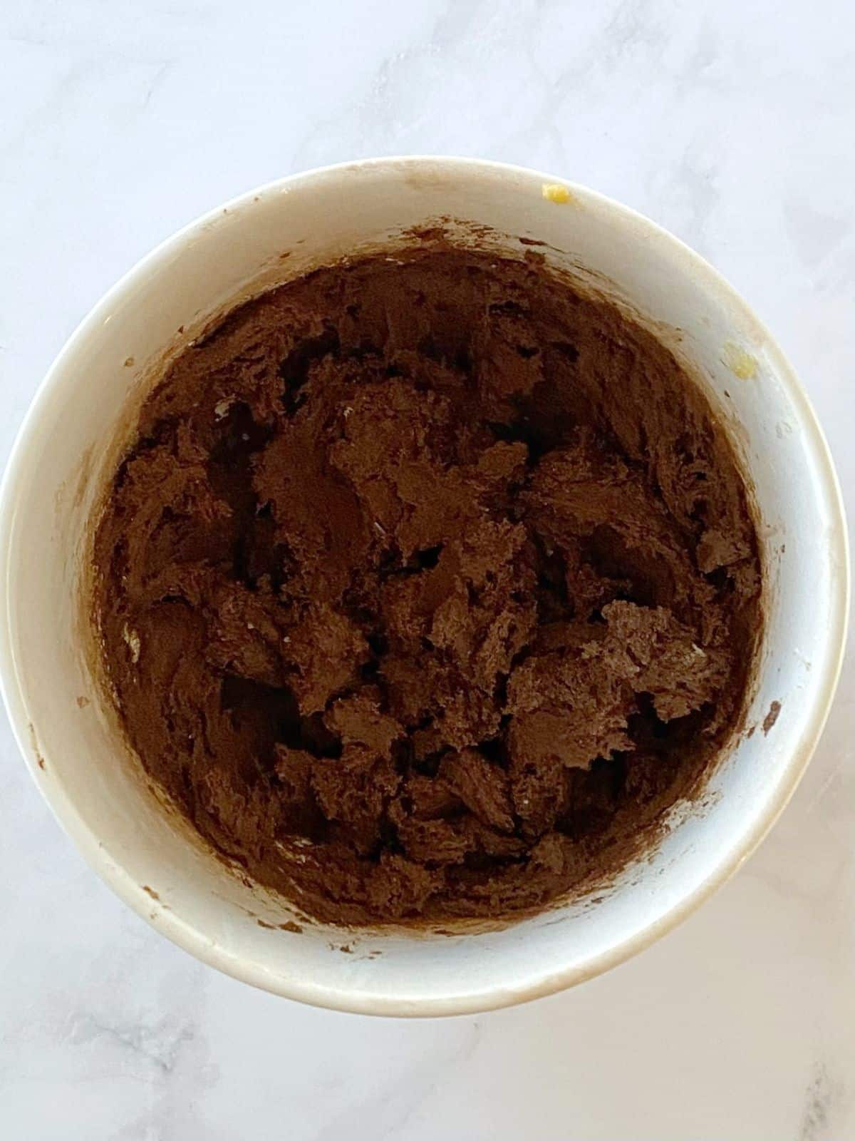 Cookie dough in a mixing bowl.