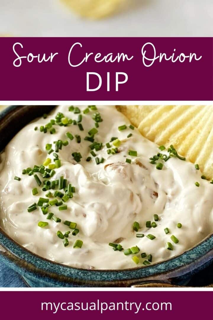 Sour cream onion dip in a bowl with potato chips.