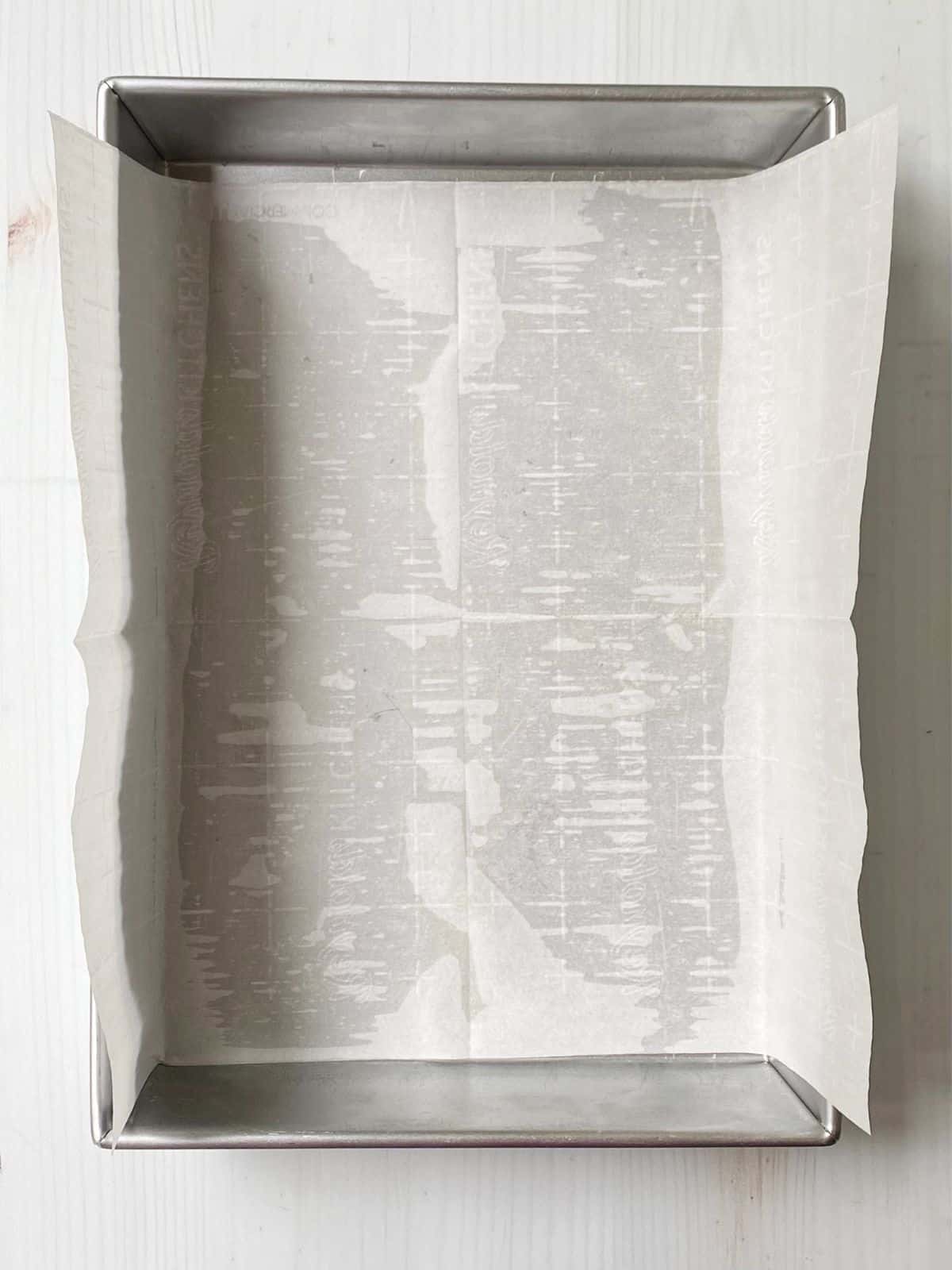 Baking pan lined with parchment paper.