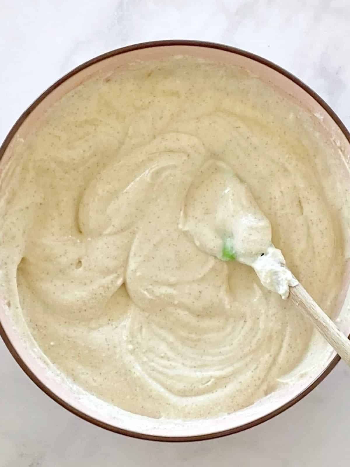 Vanilla ricotta mixture in a bowl.