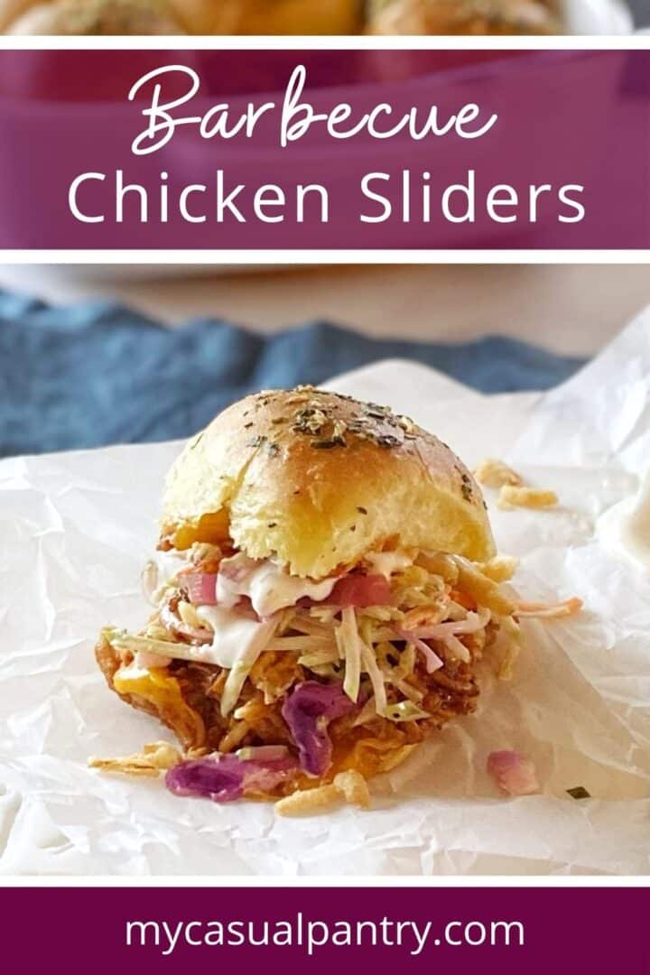 Chicken slider on parchment paper.