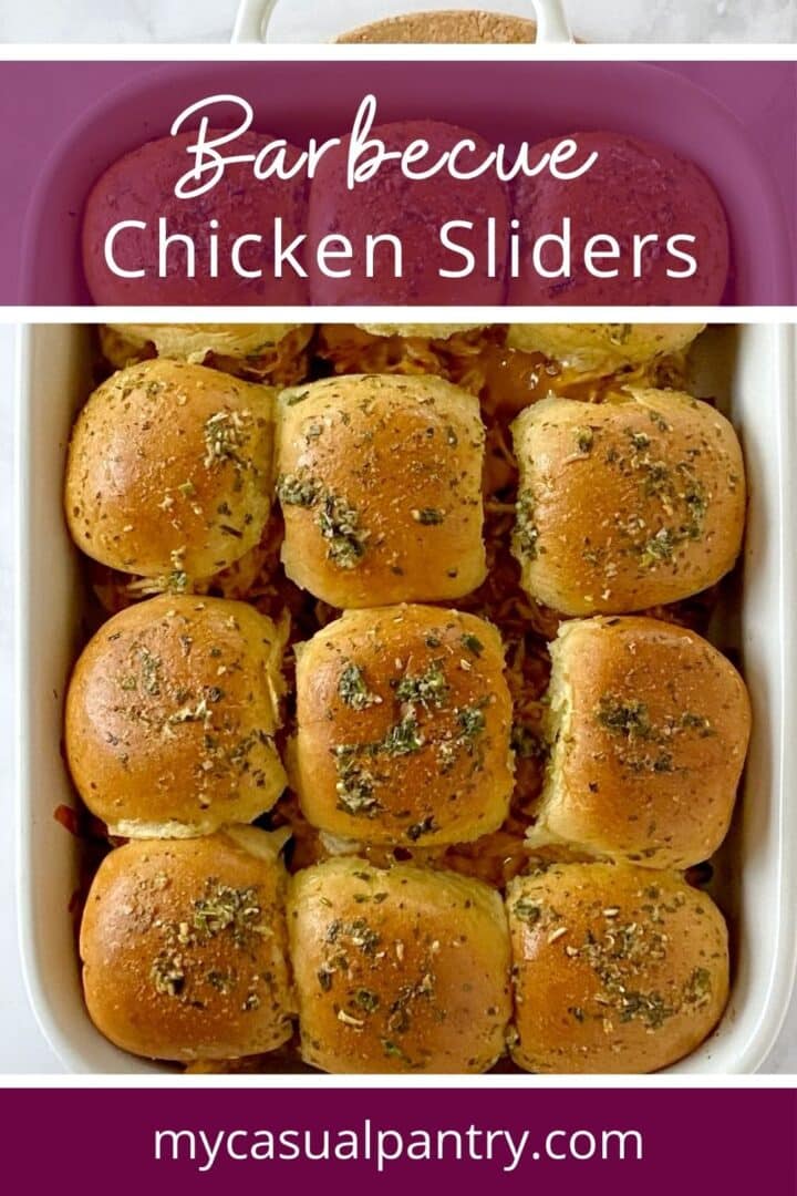 Baked sliders in a casserole dish.