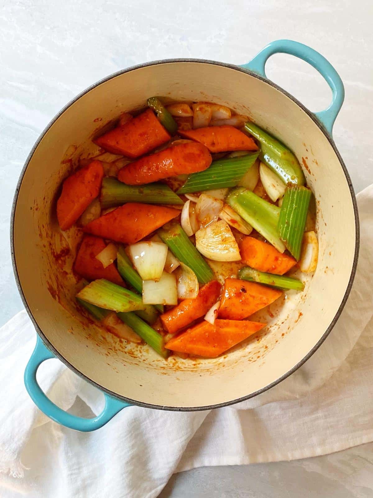 Vegetables in a Dutch oven.