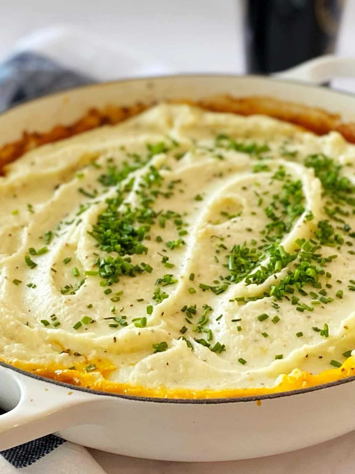 Casserole topped with chopped chives.