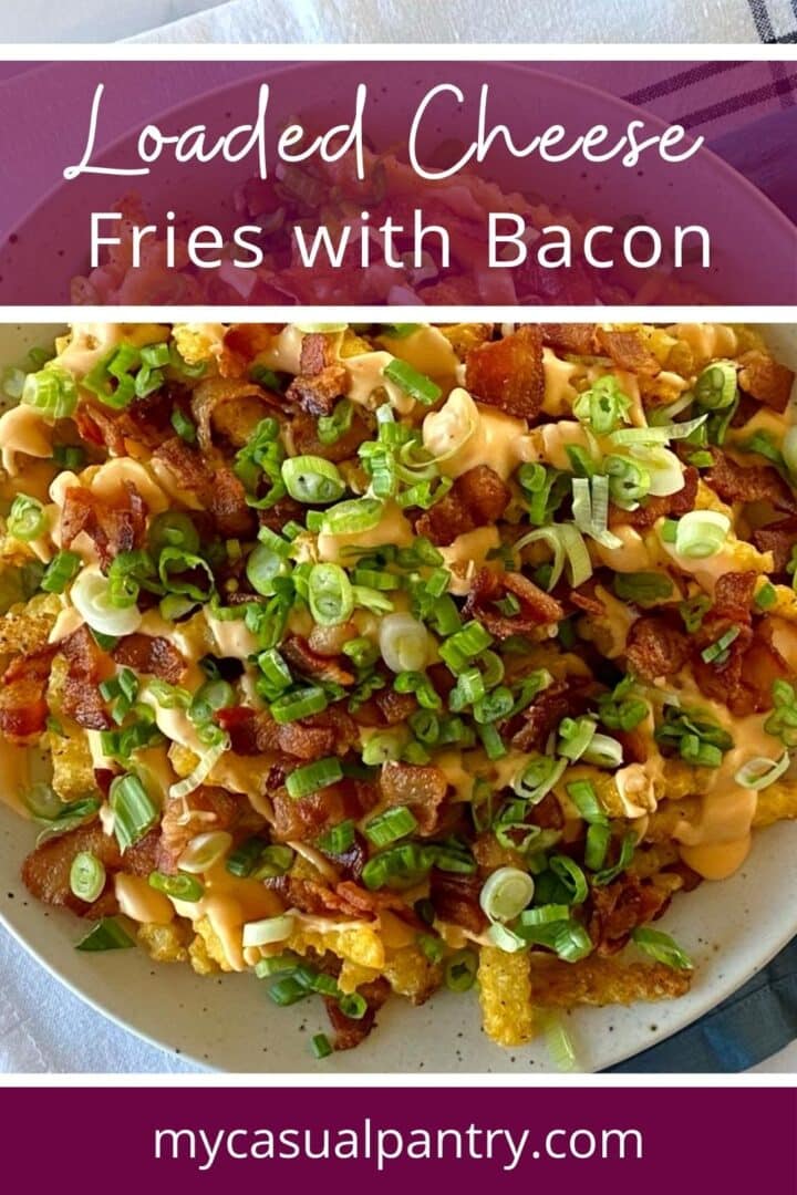 A platter of bacon and cheese fries.
