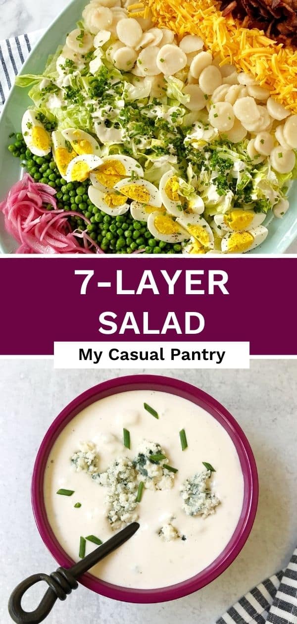 A large platter of salad and a dish of blue cheese dressing.