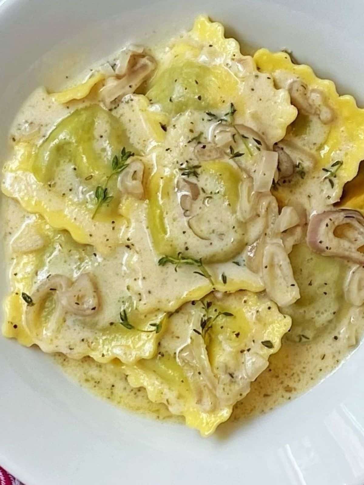 Ravioli tossed with sauce.