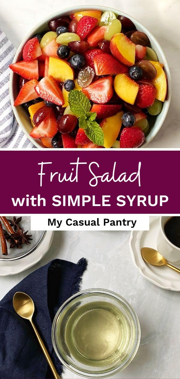 A serving bowl of fruit salad and a jar of simple syrup.