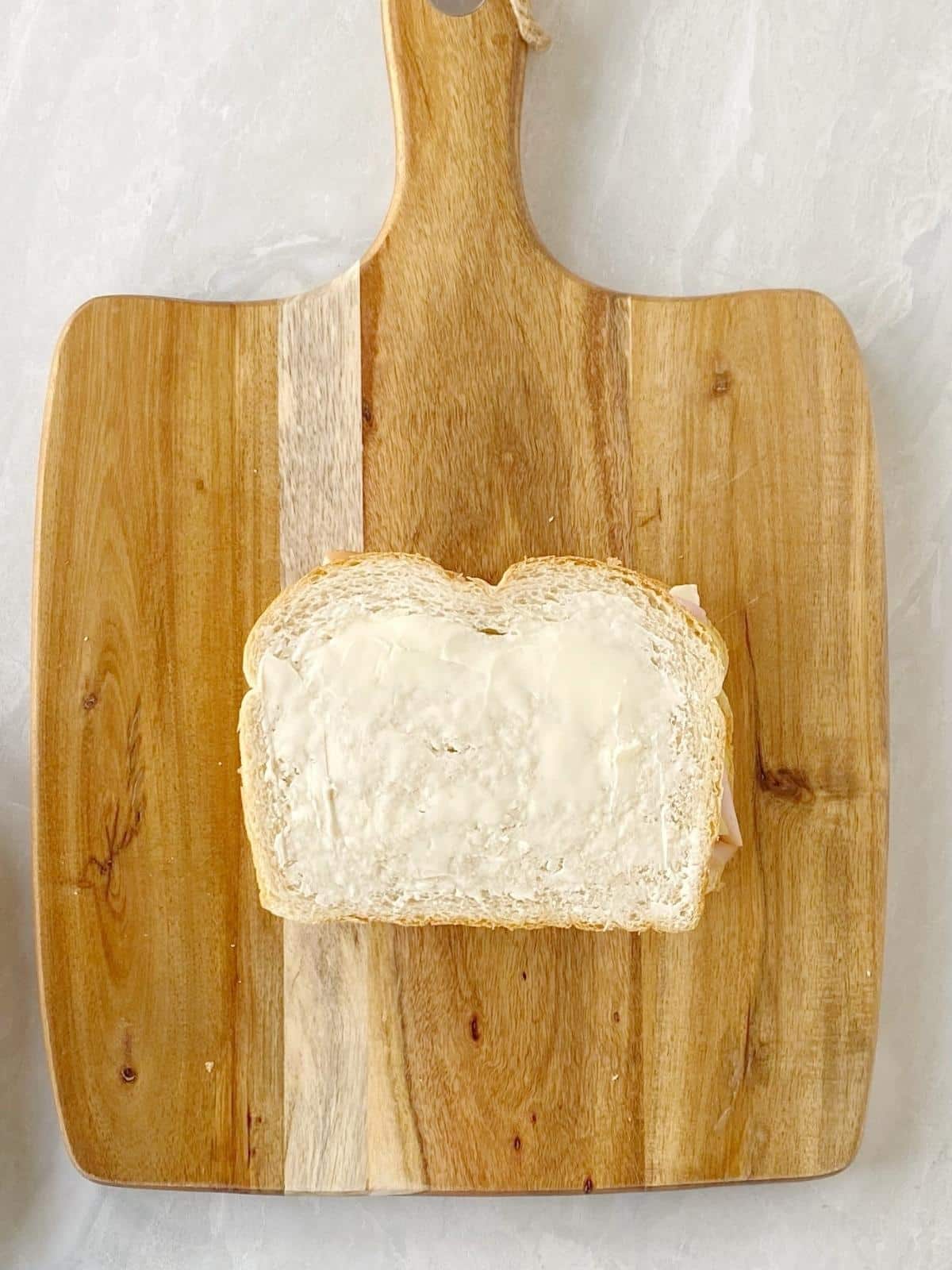 Sandwich with butter spread on the outside.