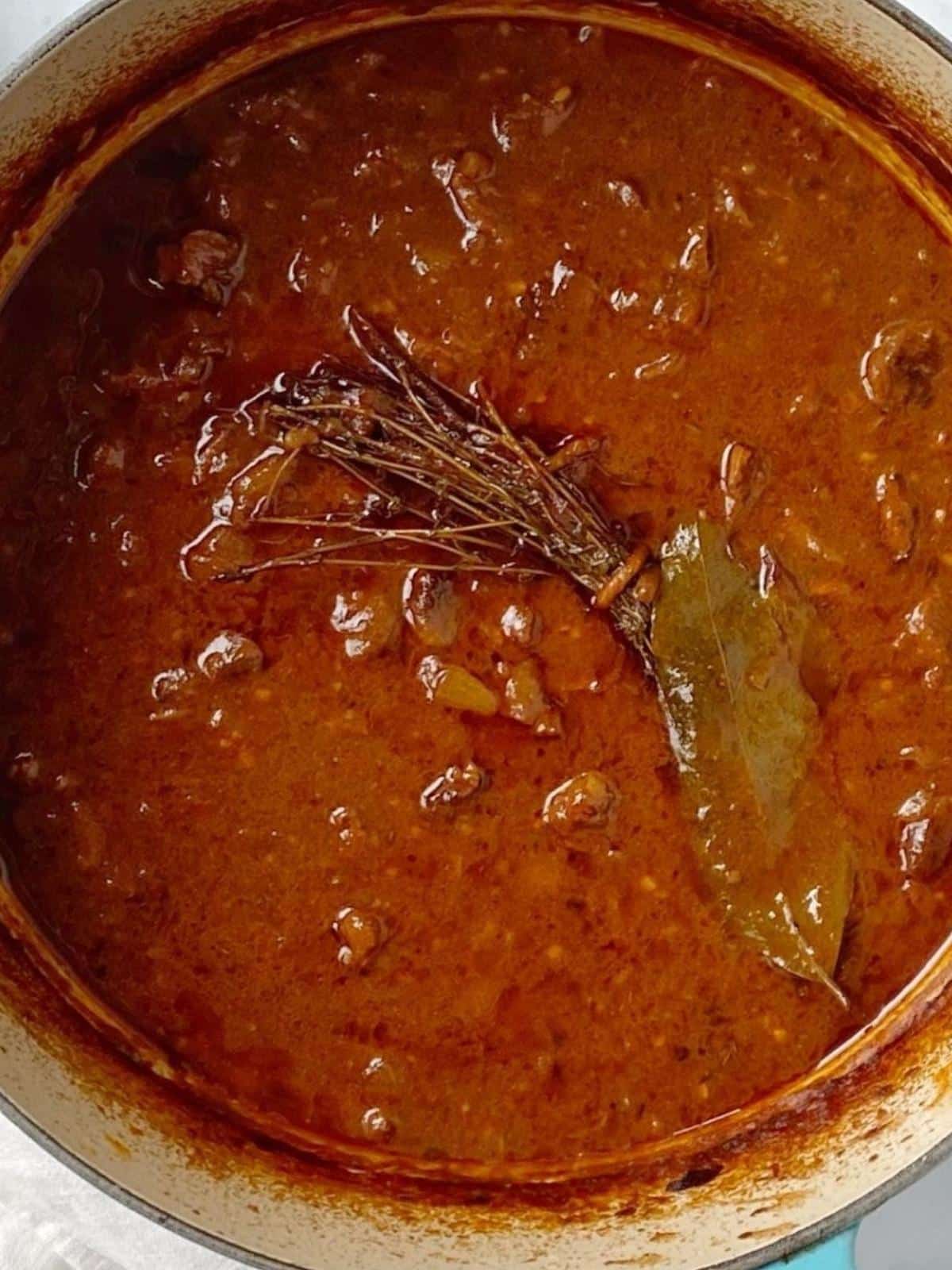 Cooked beef stew in a pot.