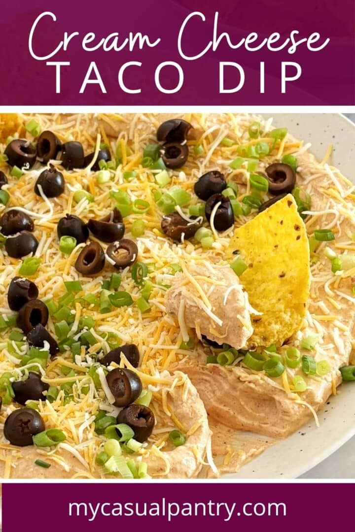 Scooping into a platter of dip.