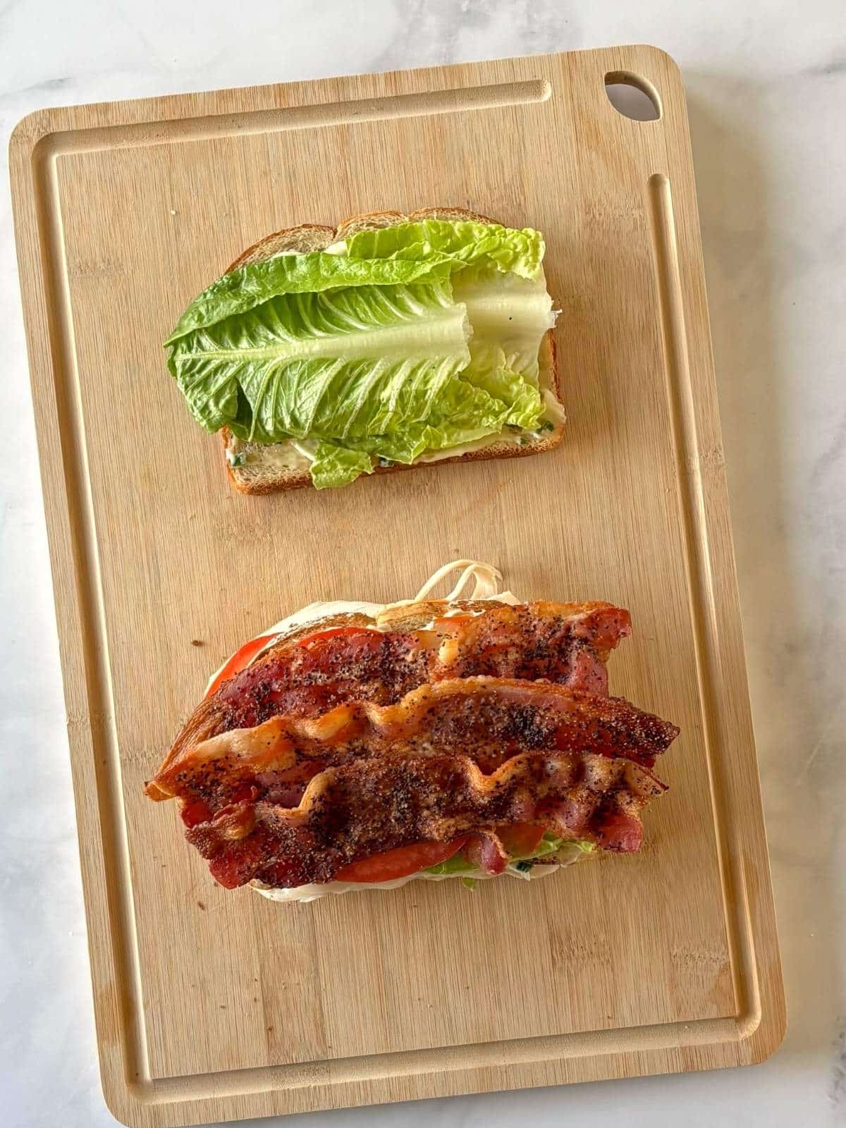 Assembling the second sandwich layer.