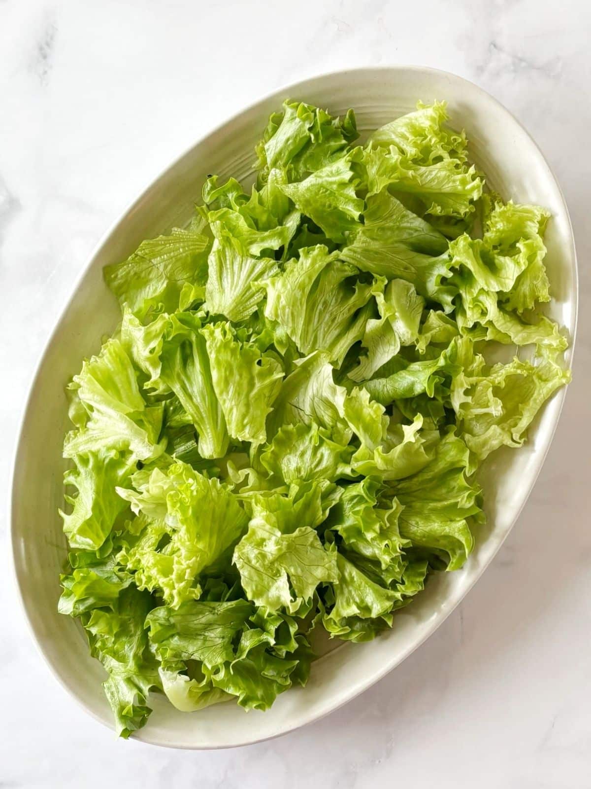 Lettuce arranged on a platter.