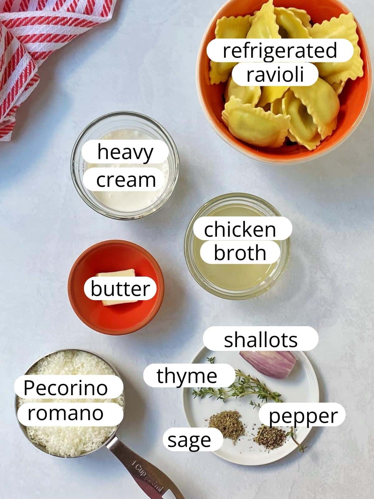 Ingredients for ravioli sauce with cheese, herbs, cream, and chicken broth.
