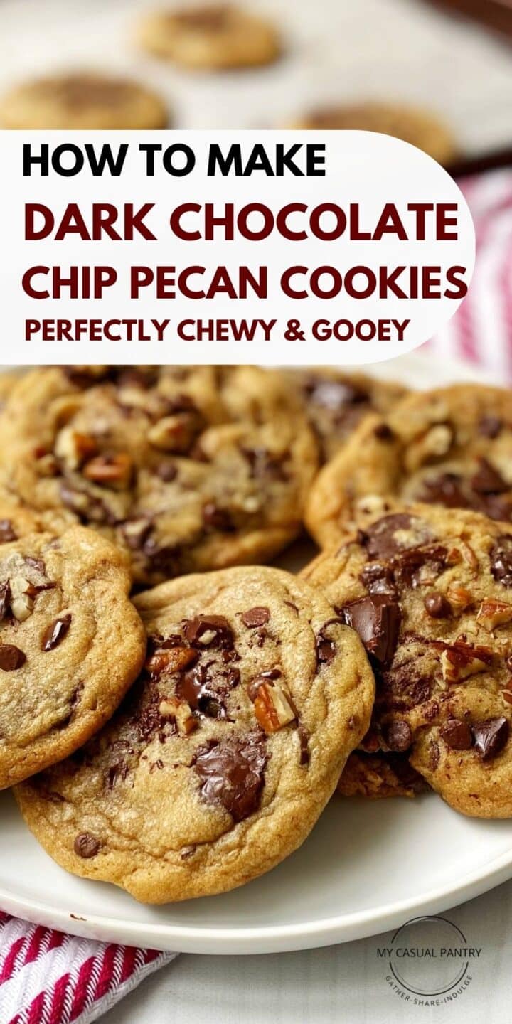 Chocolate chip cookies on a plate next to a baking sheet of cookies.