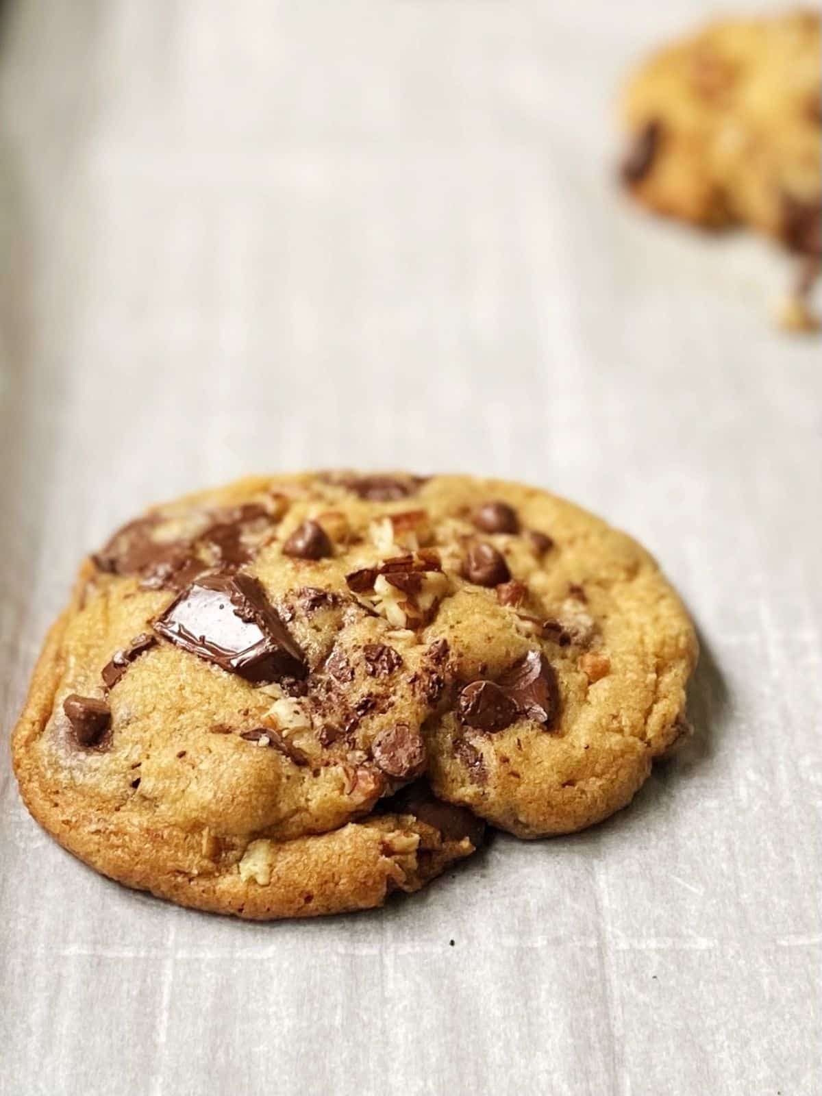 Baked cookie on a cookie sheet.